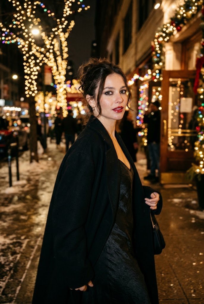 Smudged charcoal kohl eye makeup with glazed cherry red lips for holiday party makeup looks